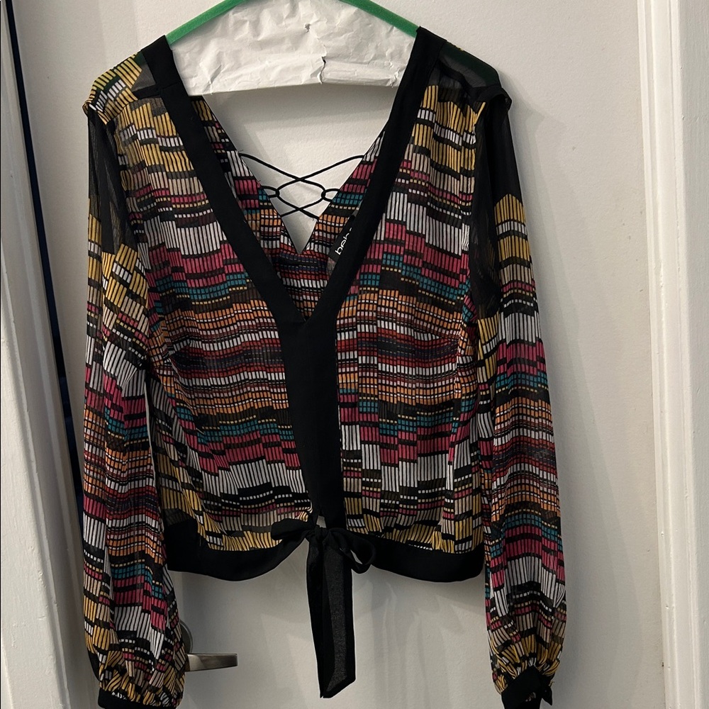 Bebe EDM blouse XXS can fit a x-Small too!